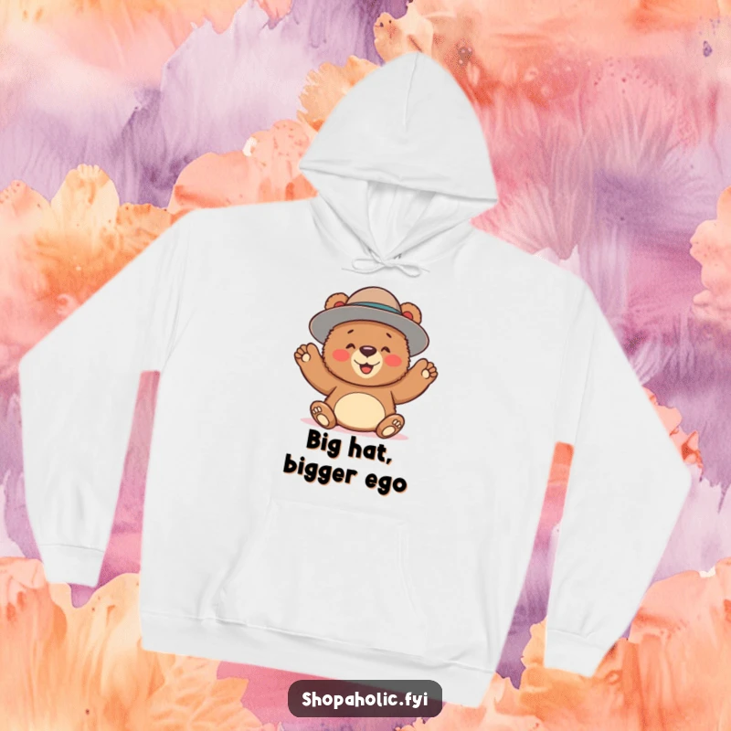 Funny hoodie featuring a bear joyfully accessorizing with an oversized hat, perfect for cozy days and humorous style.