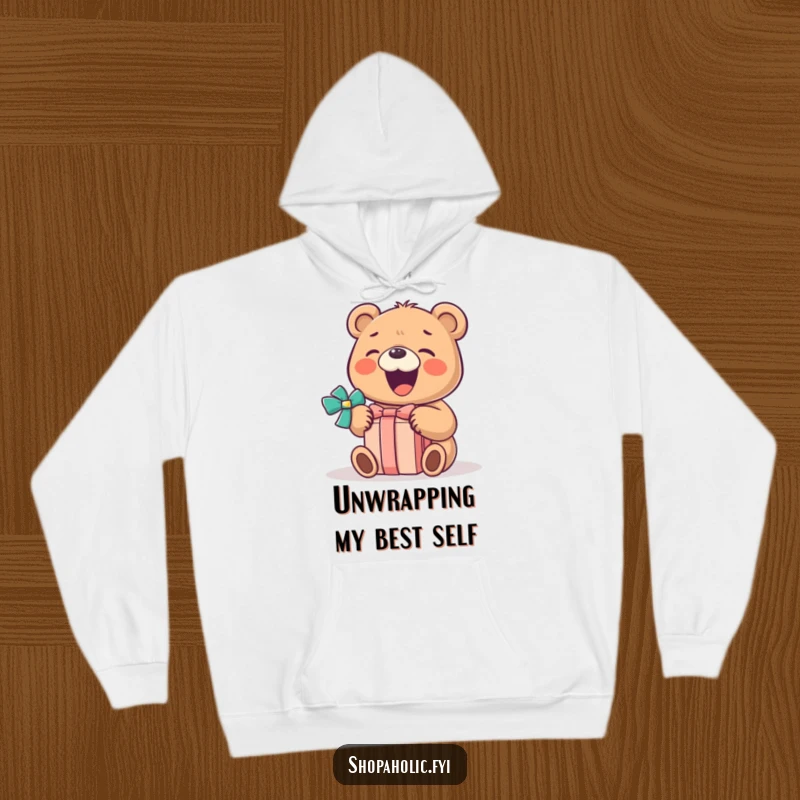 Funny Bear Hoodie: A gleeful bear opens a wrapped gift with a huge smile, bringing warmth and humor to this hoodie.