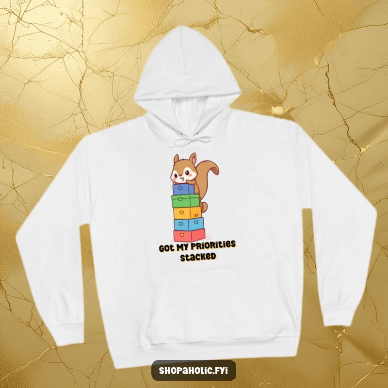 Funny Squirrel Box Tower Hoodie - Cozy hoodie featuring a determined squirrel balancing a precarious stack of colorful boxes, symbolizing organized effort.