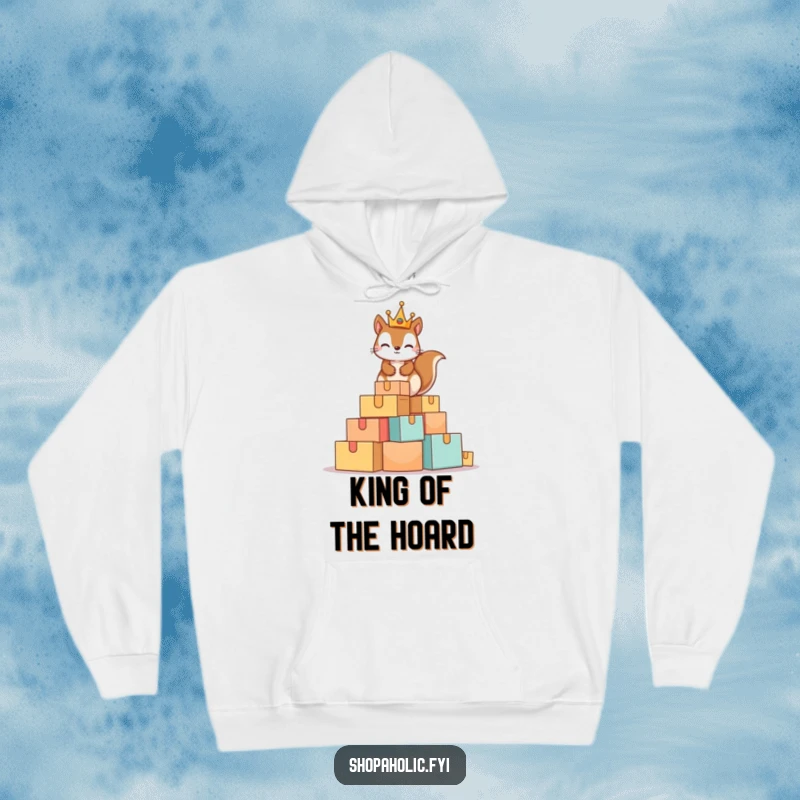 Funny Squirrel King Hoodie showing a mischievous squirrel wearing a tiny crown on a huge pile of boxes, emphasizing comfort and playful power.