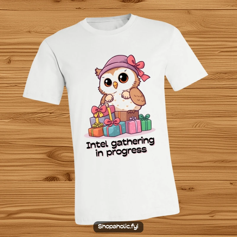 Funny Owl T-Shirt: A curious owl is shown peeking from behind a generous pile of wrapped presents, full of playful anticipation.