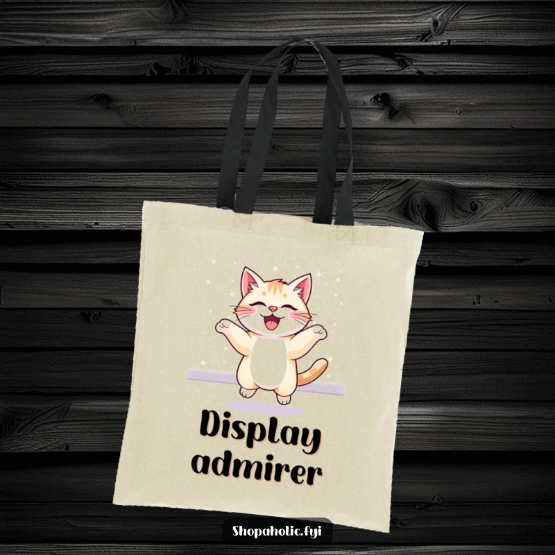 Funny tote bag depicting an excited cat bouncing with joy before a beautifully glittering display. Stylish and humorous.