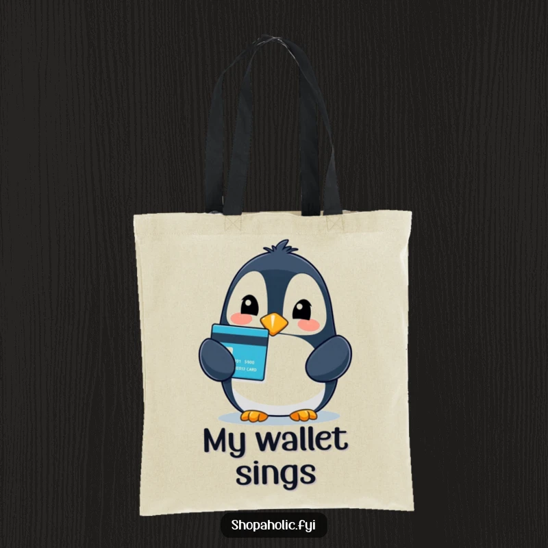 Funny tote bag featuring a beaming penguin holding a credit card, embodying the pure joy of a successful shopping trip.